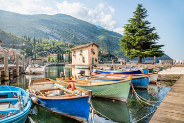 Fototapeta na wymiar Fishing boats at Torbole, Lago di Garda, Trentino, Italy