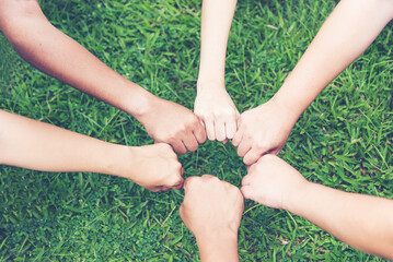 Solidarity unite people hands together community teamwork. Hands of spirit team working together outdoor. Unity strong handshake with people or agreement of feeling or happy diverse education action