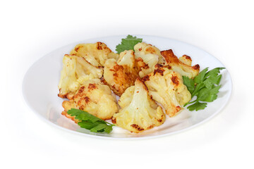 Pieces of blanched cauliflower fried in batter on dish