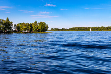 Fototapeta na wymiar Panoramic view of Zegrzynskie Reservoir Lake and Narew river with leisure and camping coastline in Zegrze resort town in Mazovia region, near Warsaw, Poland