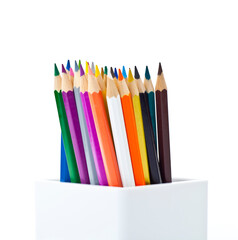 Jar filled with pencils in many different colors. Studio photo isolated on white background.