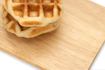 Closeup of waffles on wood