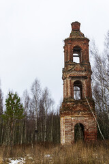 Abandoned three-tiered Orthodox bell tower, Church of the Holy Trinity in Troitsa-Zazharye, Russia, Kostroma region