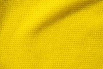 Yellow sports clothing fabric football shirt jersey texture close up