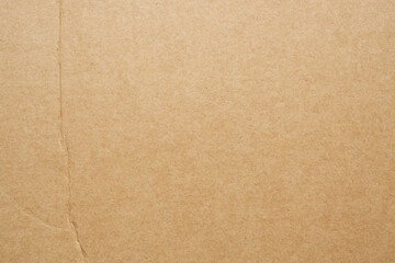 Brown eco recycled kraft paper sheet texture cardboard background