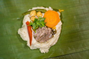Making Tamales a Latin American dish.