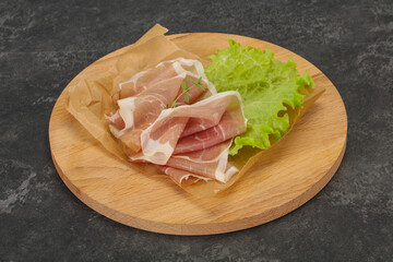 Italian prosciutto pork meat over board