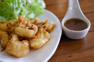 fried fish fillet with tamarind sauce