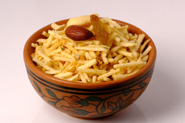 Indian style deep fried snacks falahari chivda- chivda or mixture namkeen with dry fruits.