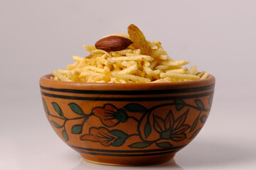 Indian style deep fried snacks falahari chivda- chivda or mixture namkeen with dry fruits.