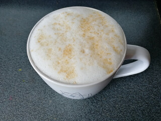 Coffee cappuccino with cinnamon in a Cup