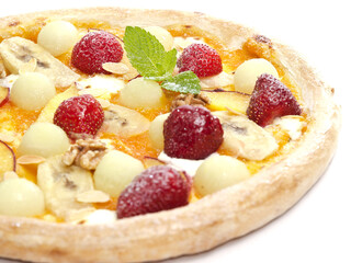 sweet pizza with strawberries, melon, banana