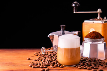 Fresh cafe for refresh caffeine white cup roasted organic coffee bean farm in vintage wood grinder classic metal coffee pot for black espresso and glass cream foam milk cappuccino latte