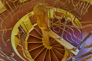 Red and gold spiral staircase