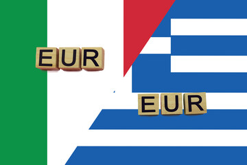 Fototapeta premium Italy and Greece currencies codes on national flags background