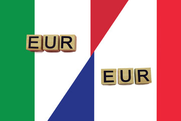 Italy and France currencies codes on national flags background