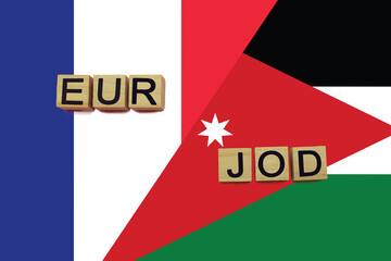 France and Jordan currencies codes on national flags background