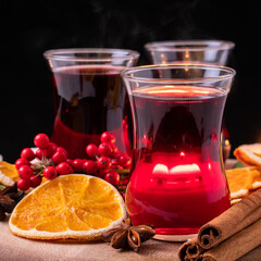 German tradition winter Christmas market new year holidays festival drink tea Gluhwein Mulled sweet hot warm red Wine with spices citrus aromatic cinnamon star anise