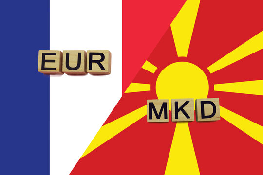 France and Macedonia currencies codes on national flags background