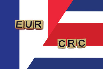 France and Costa Rica currencies codes on national flags background