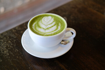 hot japanese matcha green tea with latte art.