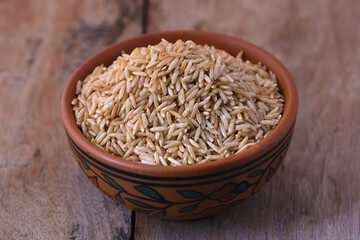 Raw brown rice in a bowl