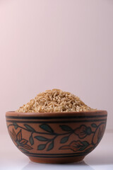 Raw brown rice in a bowl
