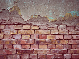 Old brick background with plaster.