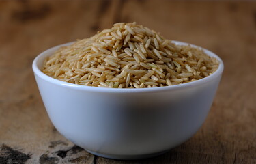 Raw brown rice in a bowl