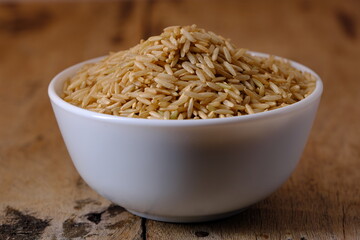 Raw brown rice in a bowl