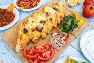 Turkish Sausage Pide or Sausage pizza / Sucuklu Pide