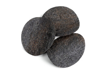 Chips black. Chips with added charcoal and peppers. White background