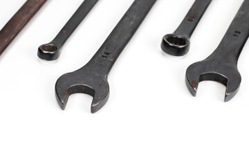 Spanner Set Isolated. dark coloured spanners on white background.