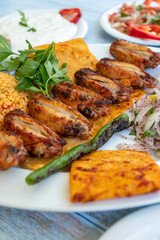 BBQ Chicken Wings with Sauce. grilled chicken wings