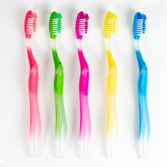 Set colorful toothbrushes on white background