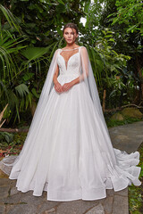 Beautiful sexy woman model bride wearing white long silk and lace wedding dress fashion espousal...