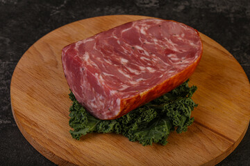 Beef ham piece over board