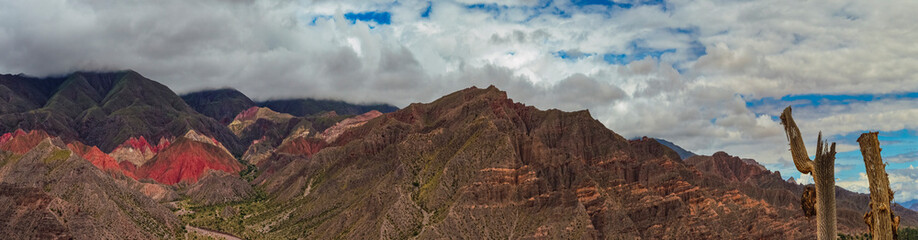 Fototapeta premium Panoramic photo of the landscape view from archaeological monument at Pucara of Tilcara - old pre inca ruins - Jujuy, Argentina. Quebrada de Humahuaca