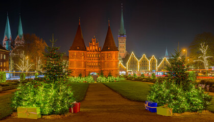 View of festive lighting and Christmas romantic atmosphere in the Hanseatic city of Lübeck at...