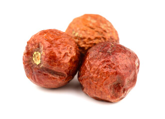 Closeup on Jujube Dried Fruit (Ziziphus Spina-Christi, or Christ's Thorn Jujube). Isolated on White Background.