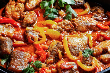 Moqueca baiana - brazilian fish stew with lime
