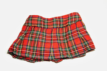 Red plaid mini skirt isolated on white background