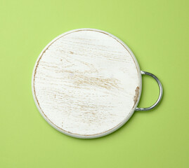 white empty round cutting wooden board