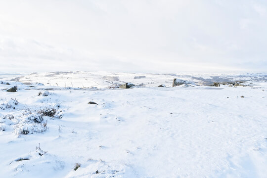 Almost a whiteout with a blanket of white cloud over a snow covered Derbyshire Peak District
