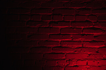 Horizontal background textured of brick wall with dark red neon lighting.