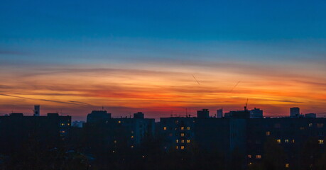 Fototapeta na wymiar Sunset over city