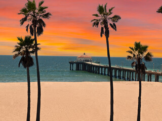 Obraz premium View of Manhattan Beach pier with sunset sky in scenic Southern California.