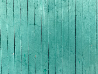 Fototapeta na wymiar Old green wooden wall made of planks textured background structure