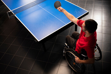 Wheelchair user playing table tennis