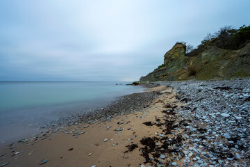 Fototapeta na wymiar Cobblestone beach on winter morning